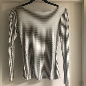 Form fitting Carly Jean top. White with black stripes. Only wore a few times.